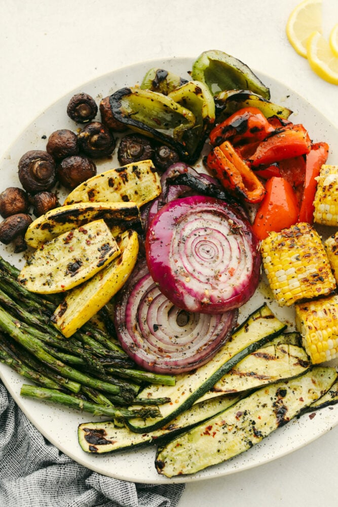 Variety of grilled vegetables on serving dish.