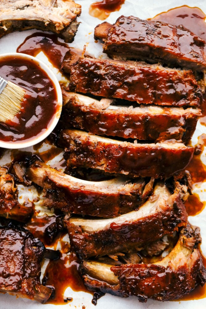 Slow cooker ribs separated with sauce. 