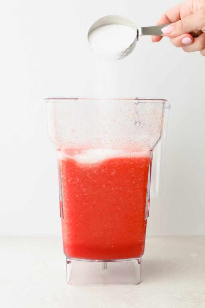 Adding sugar to watermelon agua fresca