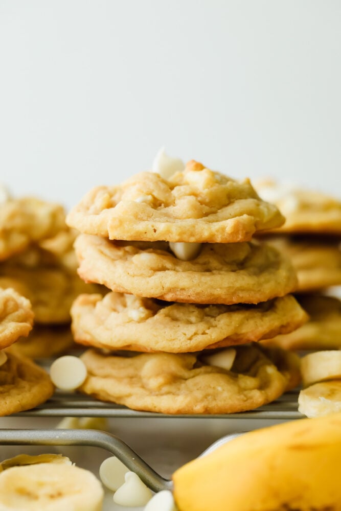 Banana pudding cookies stacked on top of each other. 