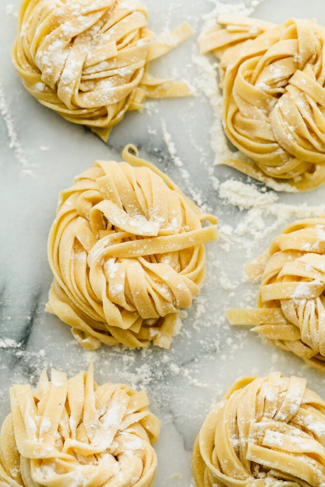 Homemade pasta in nests ready to cook. 