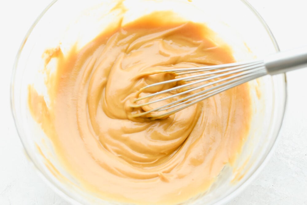 Whisking Peanut Sauce ingredients together.