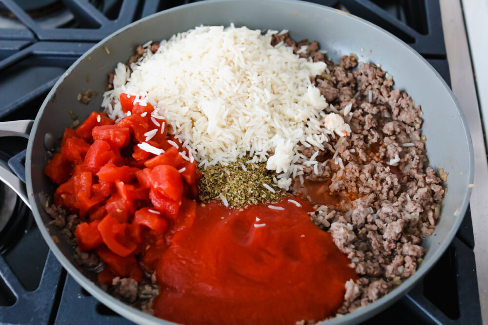 Stuffed bell peppers are filled with lean ground beef, rice, tomatoes, and the perfect blend of seasonings all topped with shredded cheese. Individually wrapped peppers make a colorful and delicious dinner with a beef combination full of flavor.