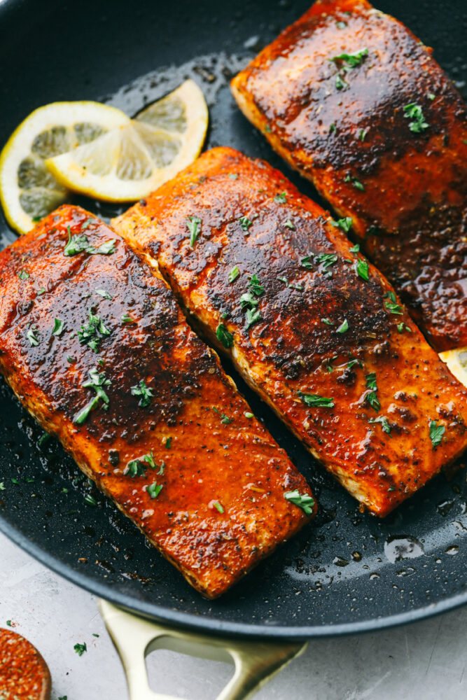 Blackened Salmon in a pan seared to perfection. 