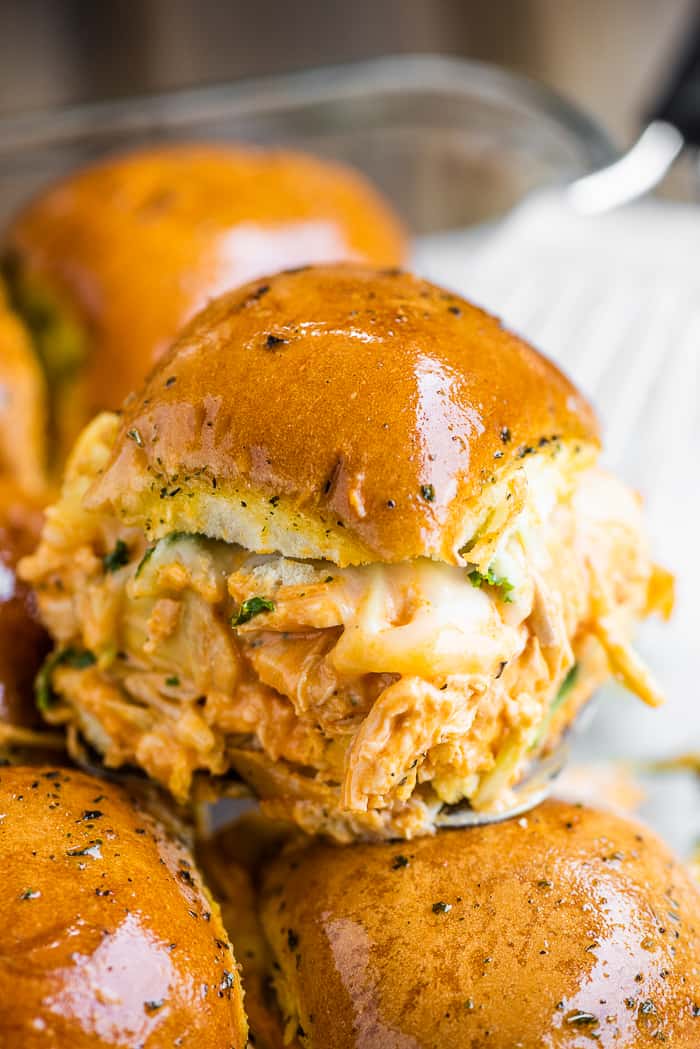 A close up of a buffalo chicken slider.