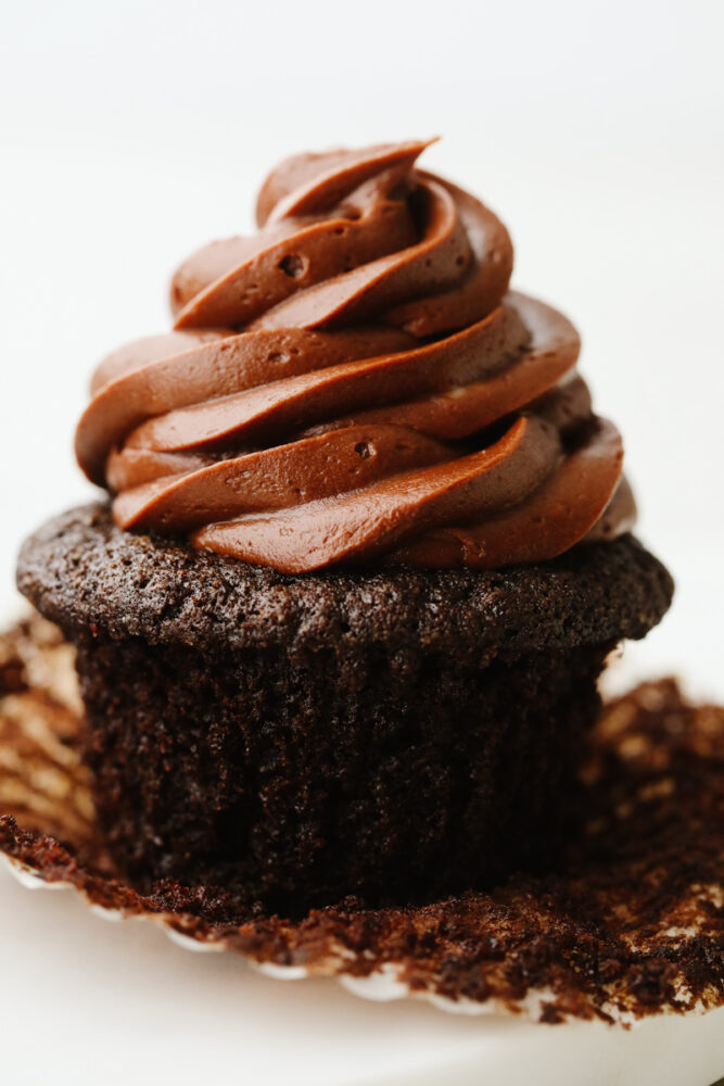 One chocolate cupcake, frosted.