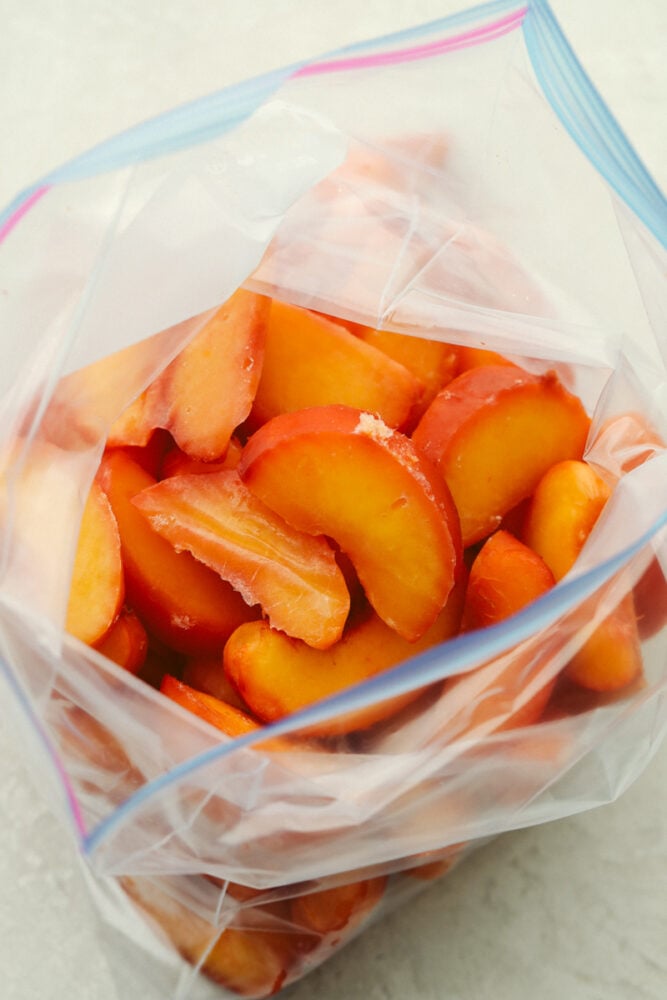 Frozen, sliced peaches in a ziplock bag. 
