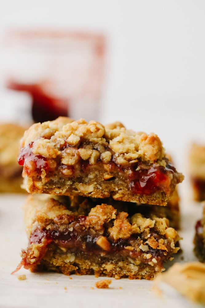A stack of 2 peanut butter and jelly bars.