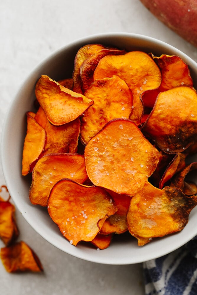 Air fryer sweet potato chips in a bowl. 