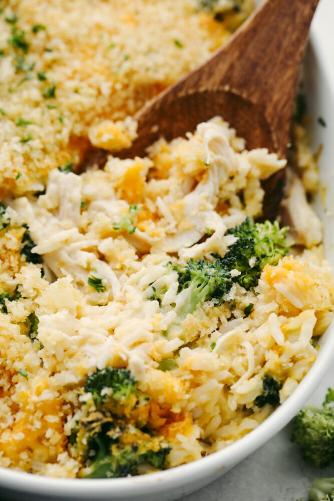 A zoomed in picture of broccoli and rice chicken casserole. 