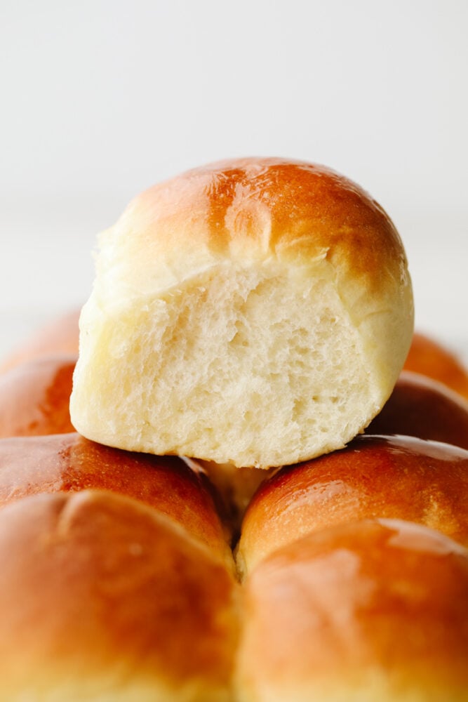 Dinner rolls stacked on top of each other.
