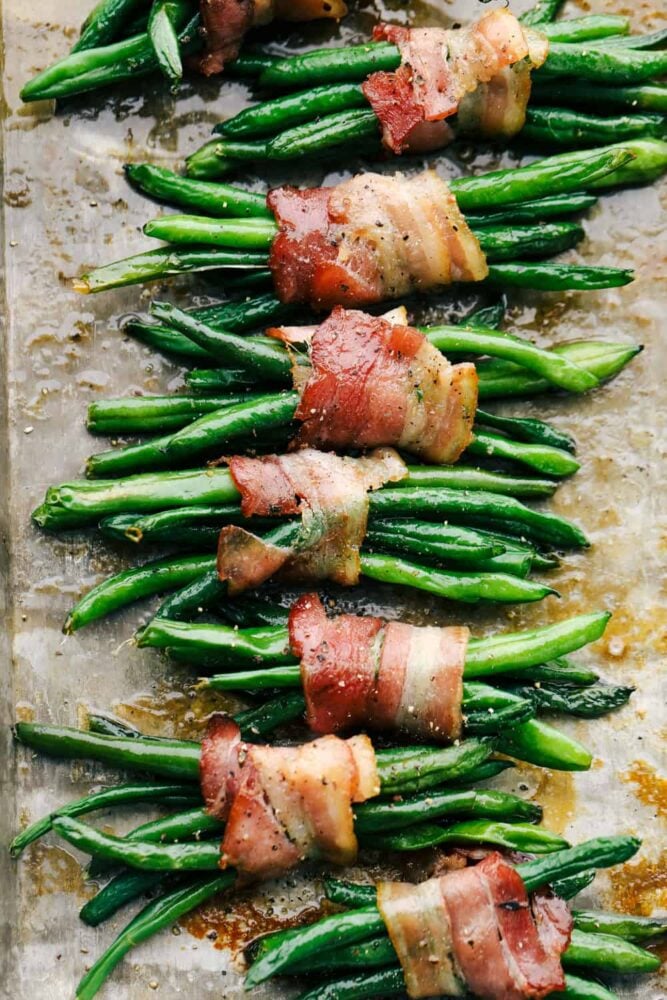 Beans wrapped in bacon, cooked and ready to eat. 