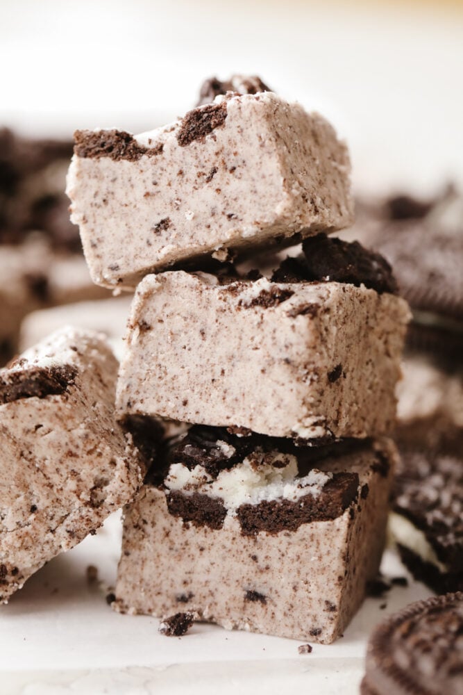 A stack of cookies and cream fudge squares. 