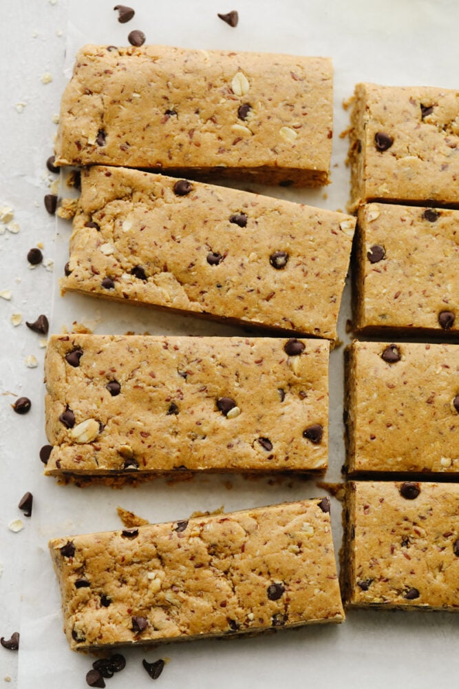 A zoomed in shot of protein bars on parchment paper. 