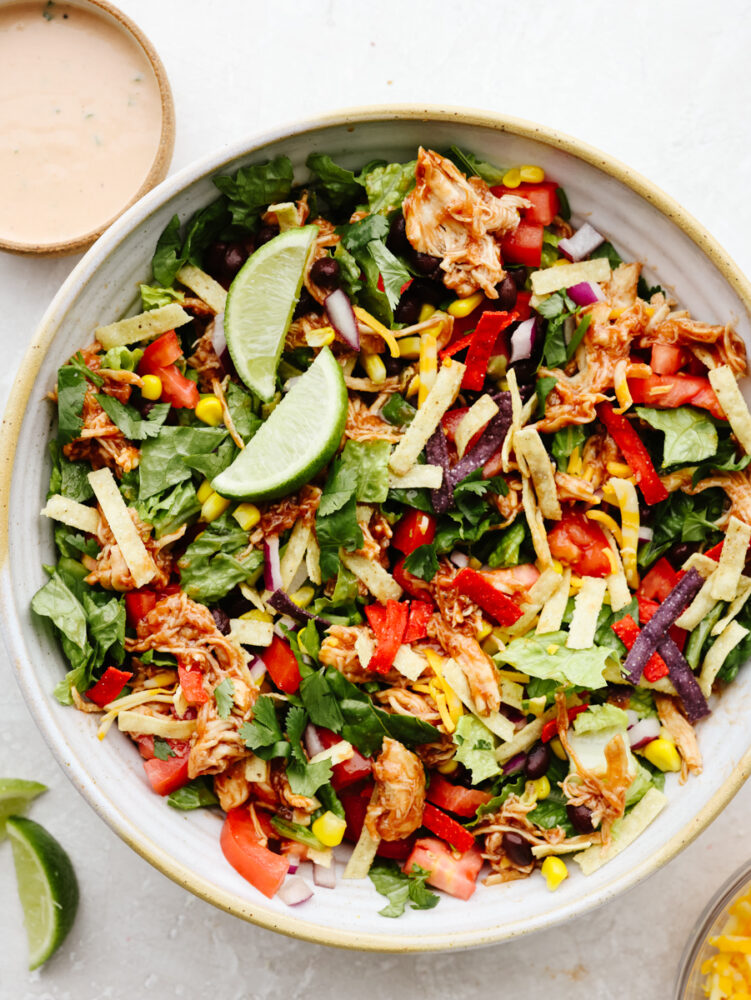 A bowl of BBQ chicken salad. 