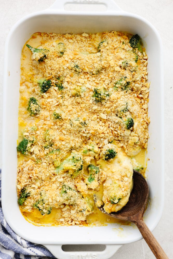 A casserole dish with broccoli cheddar chicken. 