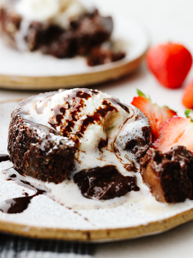 Chocolate lava cake with melted ice cream on top. 