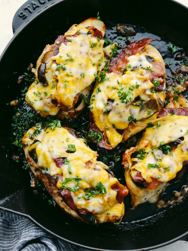 4 pieces of Alice Springs Chicken in a skillet.