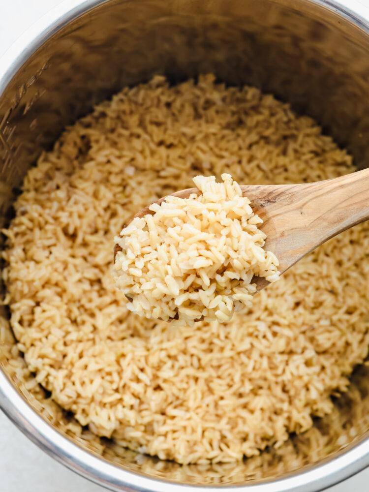 Closeup of a scoop of brown rice.