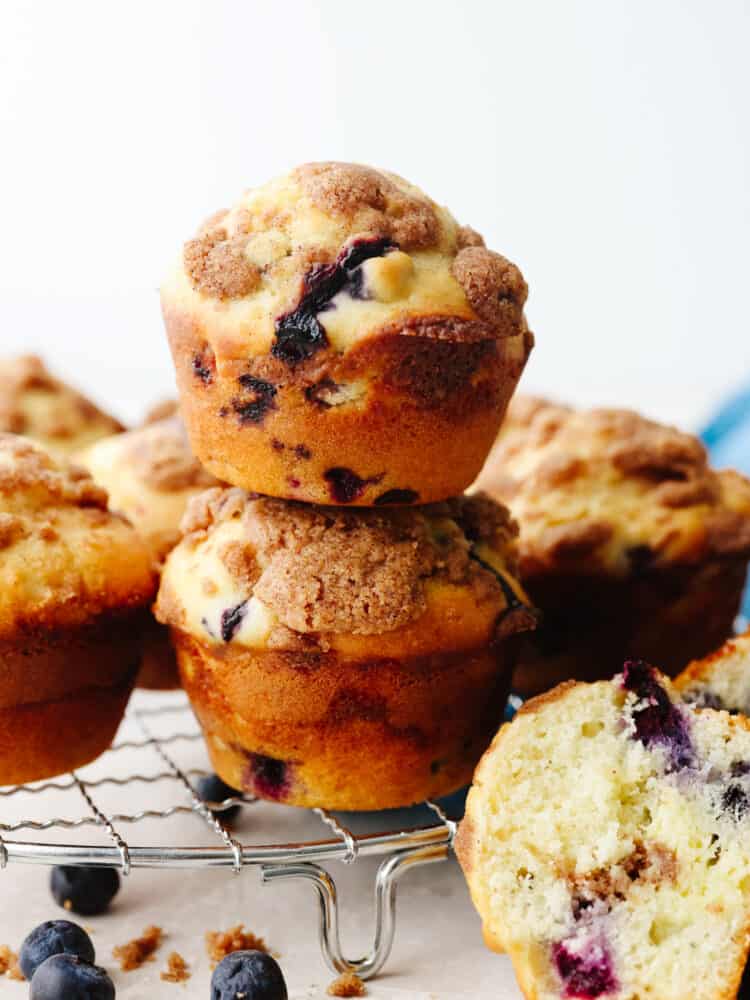 A stack of blueberry cheesecake streusel muffins