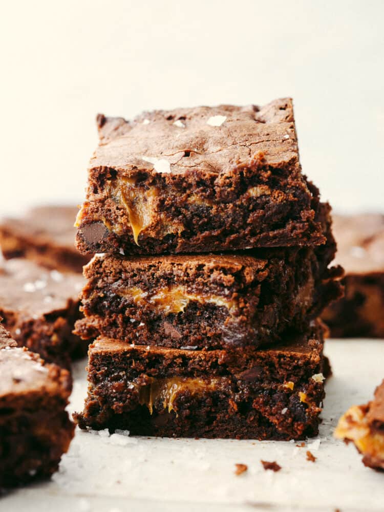 A stack of salted caramel brownies. 