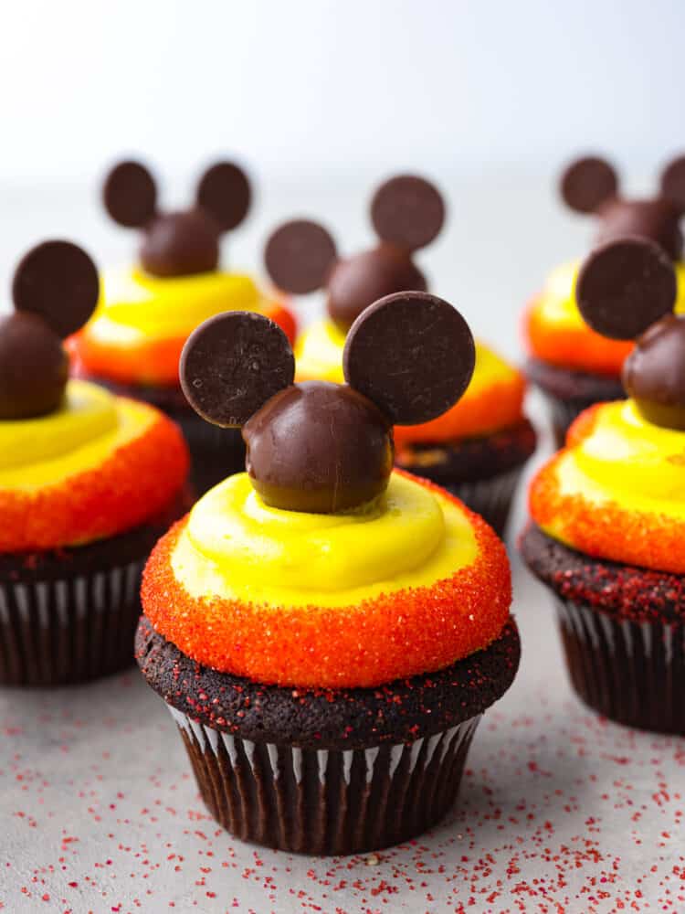 A zoomed in shot of a Mickey Mouse cupcake. 