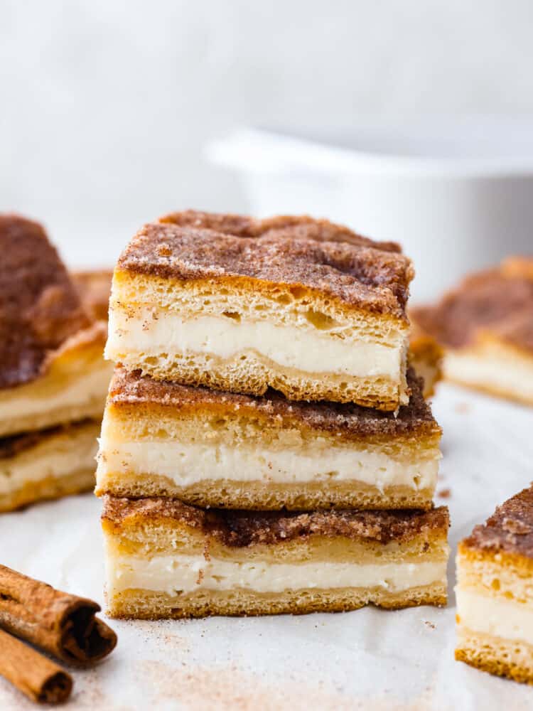 A stack of sopapilla cheesecake bars. 