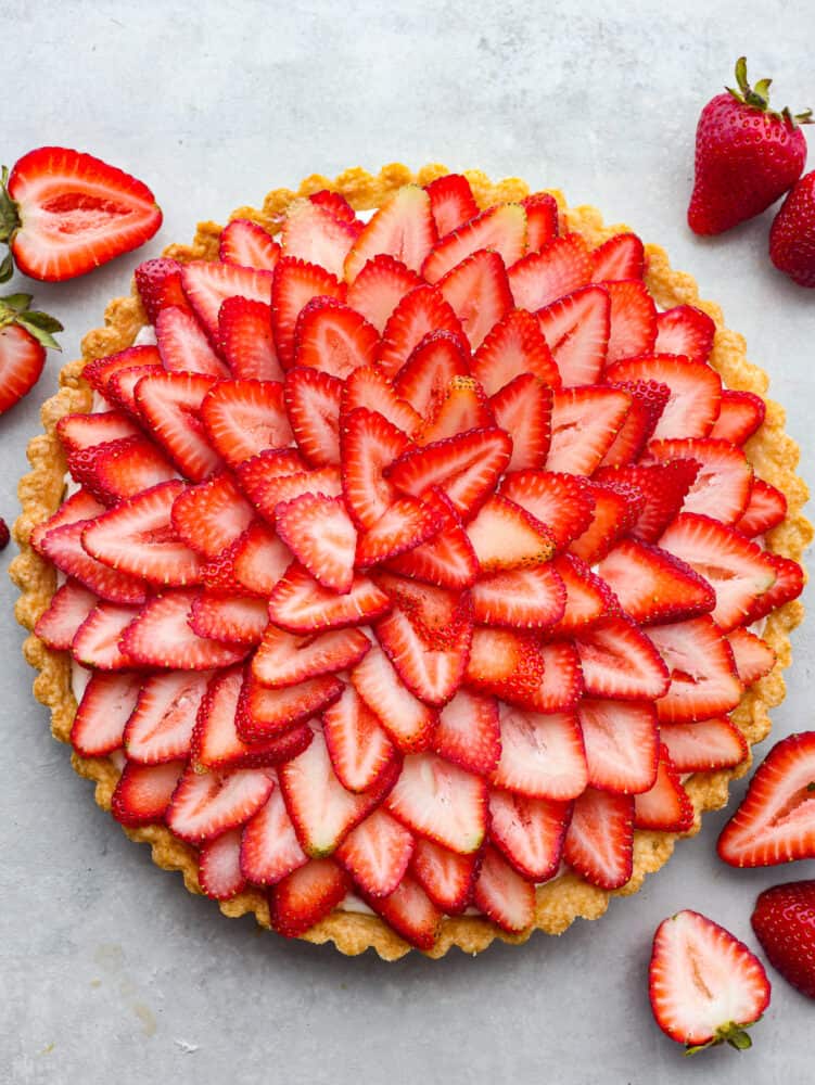 Top-down view of a whole strawberry tart.