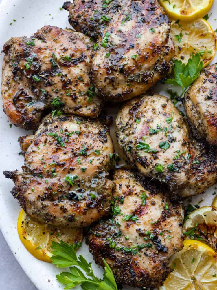 A close up of grilled lemon chicken. 