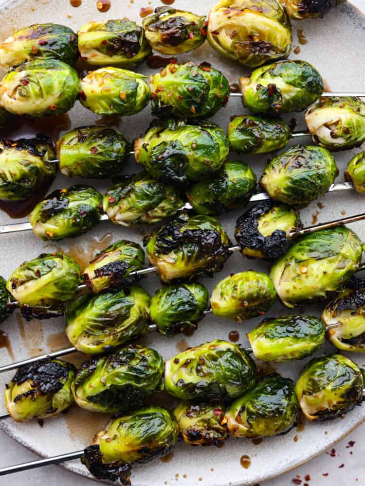 Closeup of brussels sprouts skewers.