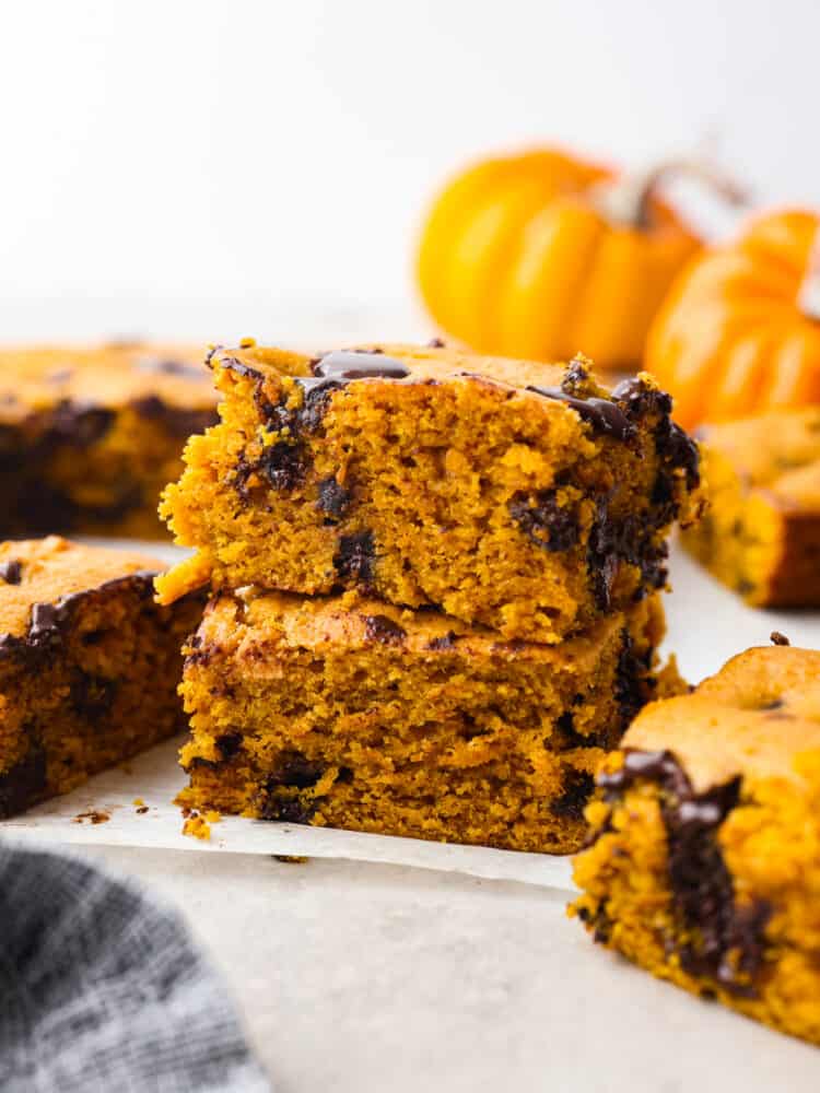 A stack of two pumpkin chocolate chip bars. 