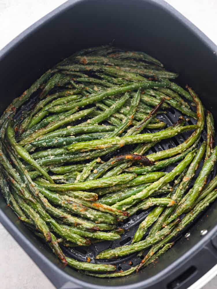 Cooked green beans in an air fryer. 