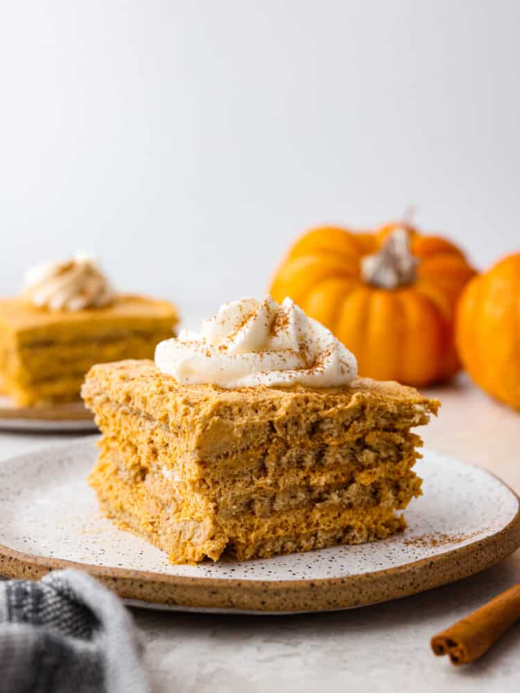 Pumpkin icebox cake on a speckled plate. 