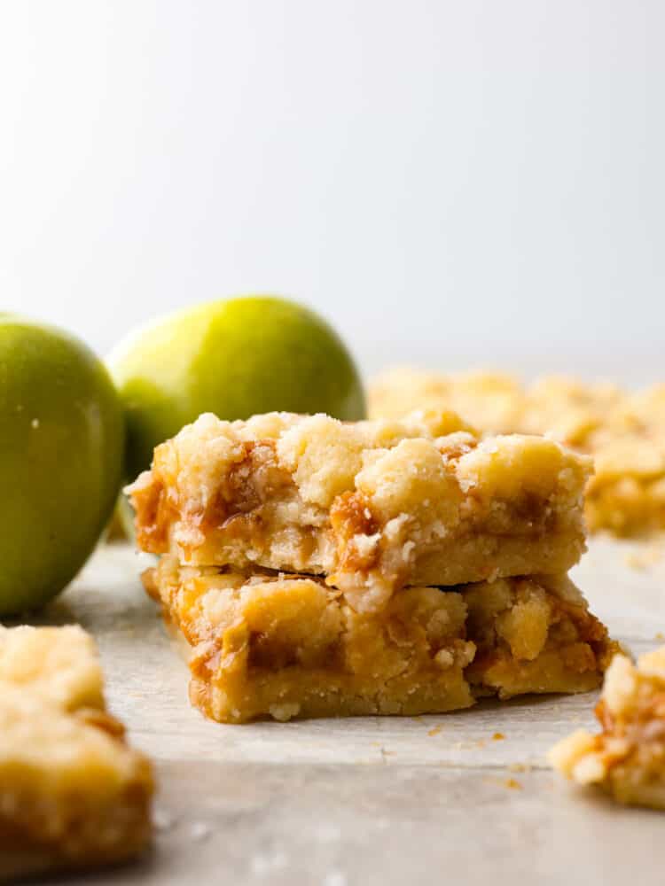 A stack of 2 salted caramel apple bars. 