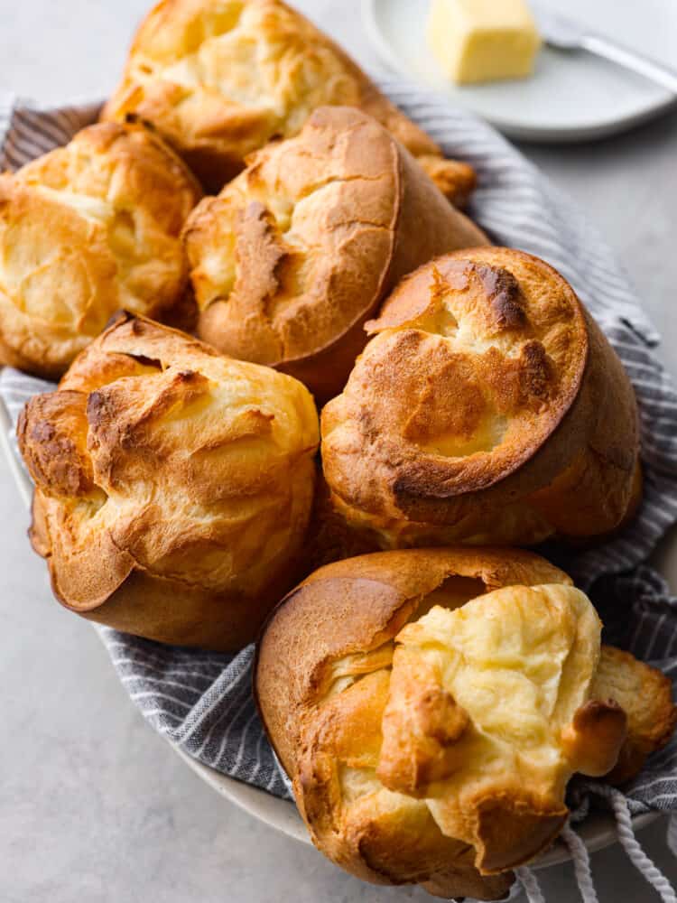 6 popovers in a serving dish.