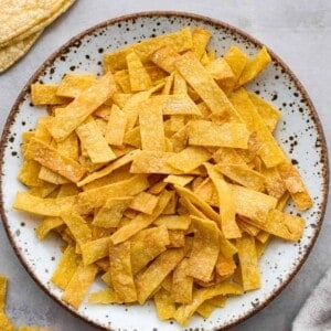 A plate of cooked tortilla strips