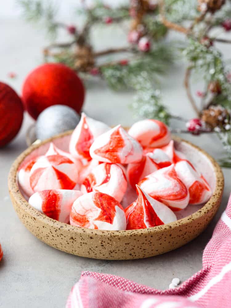 Being able to make meringue is so fun. There are a few things you need to know how to perform, but it isn't difficult. Here is my advice for consistently making peppermint meringue kisses a success!