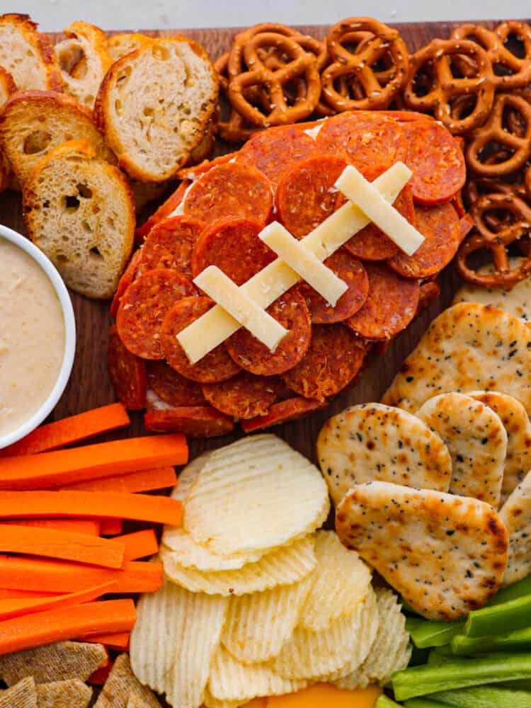 A closeup of the football shaped cheeseball. 