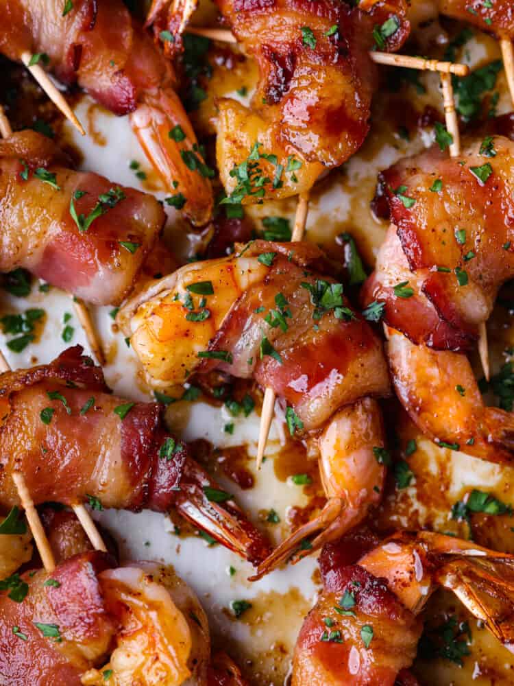 Closeup of sweet and savory bacon-wrapped shrimp.