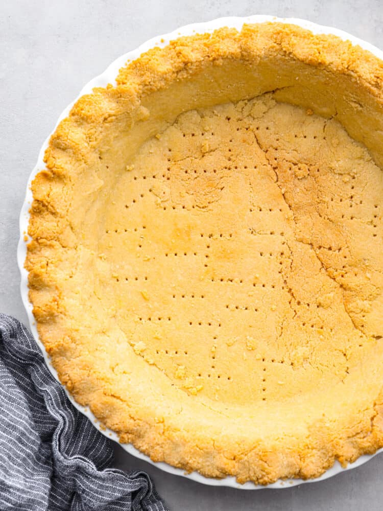 Top-down view of a baked gluten-free pie crust.
