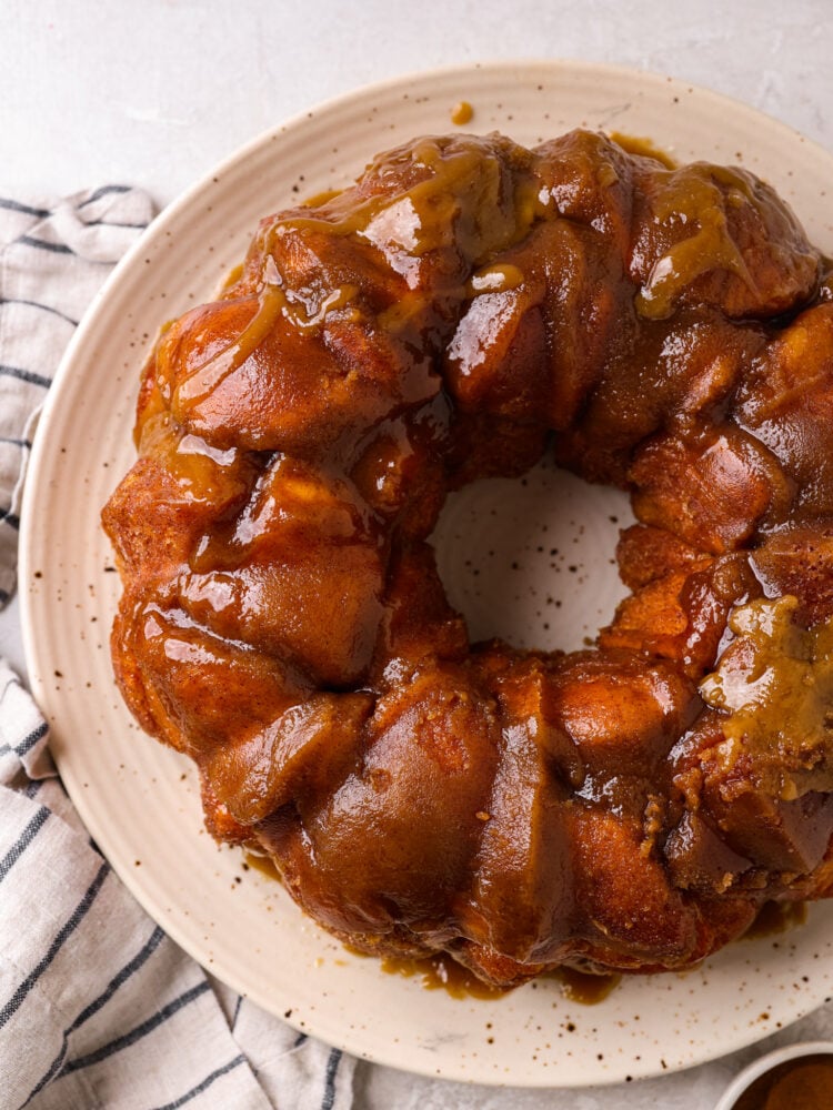 Top view of monkey bread on a white plate.