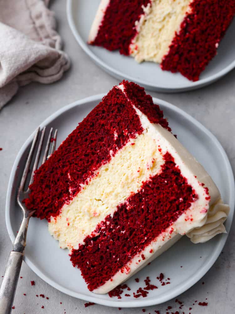 Top-down view of a slice of red velvet cheesecake.