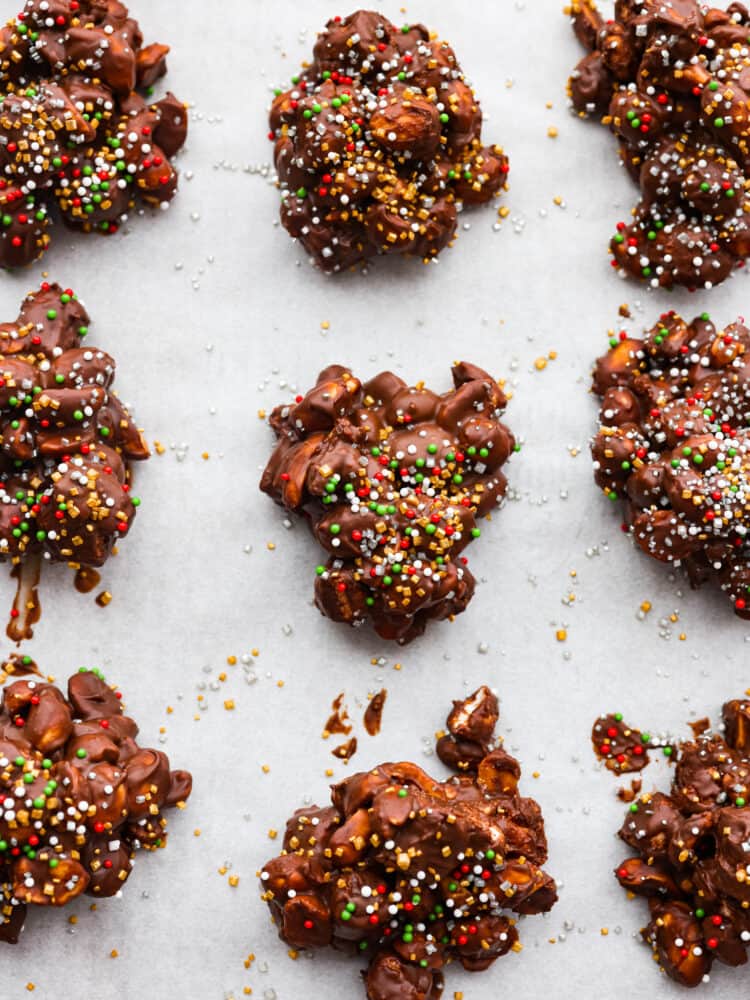 A close up on the candy nut clusters with sprinkles on top.