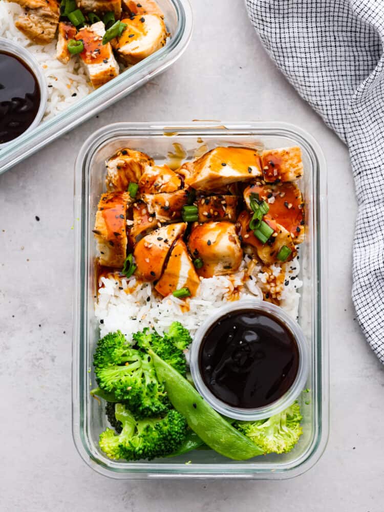 Teriyaki chicken meal prep bowls in glass containers 