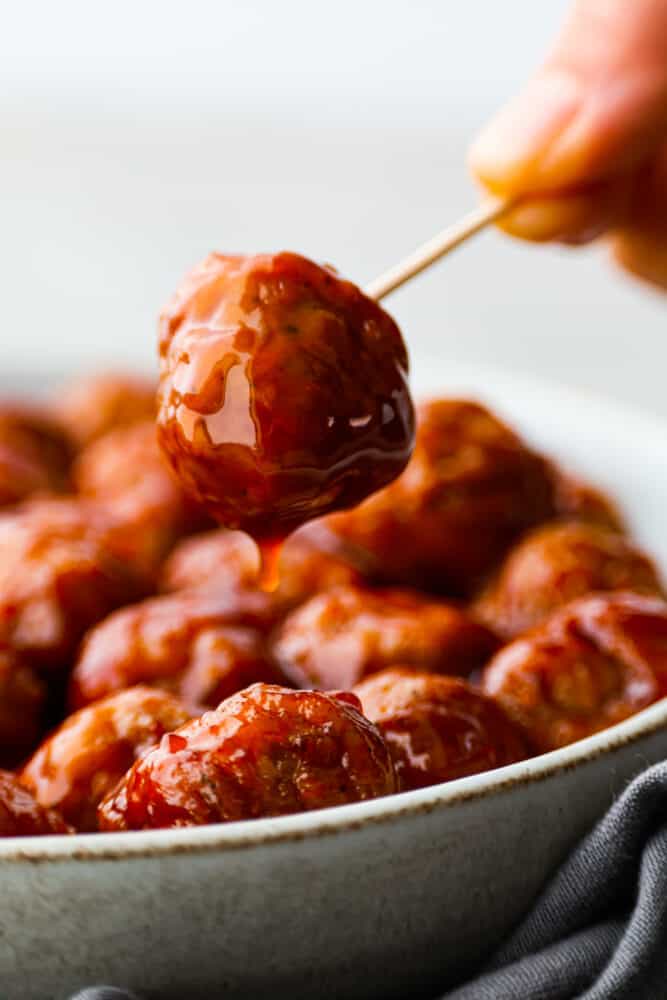 A bbq meatball on a toothpick.