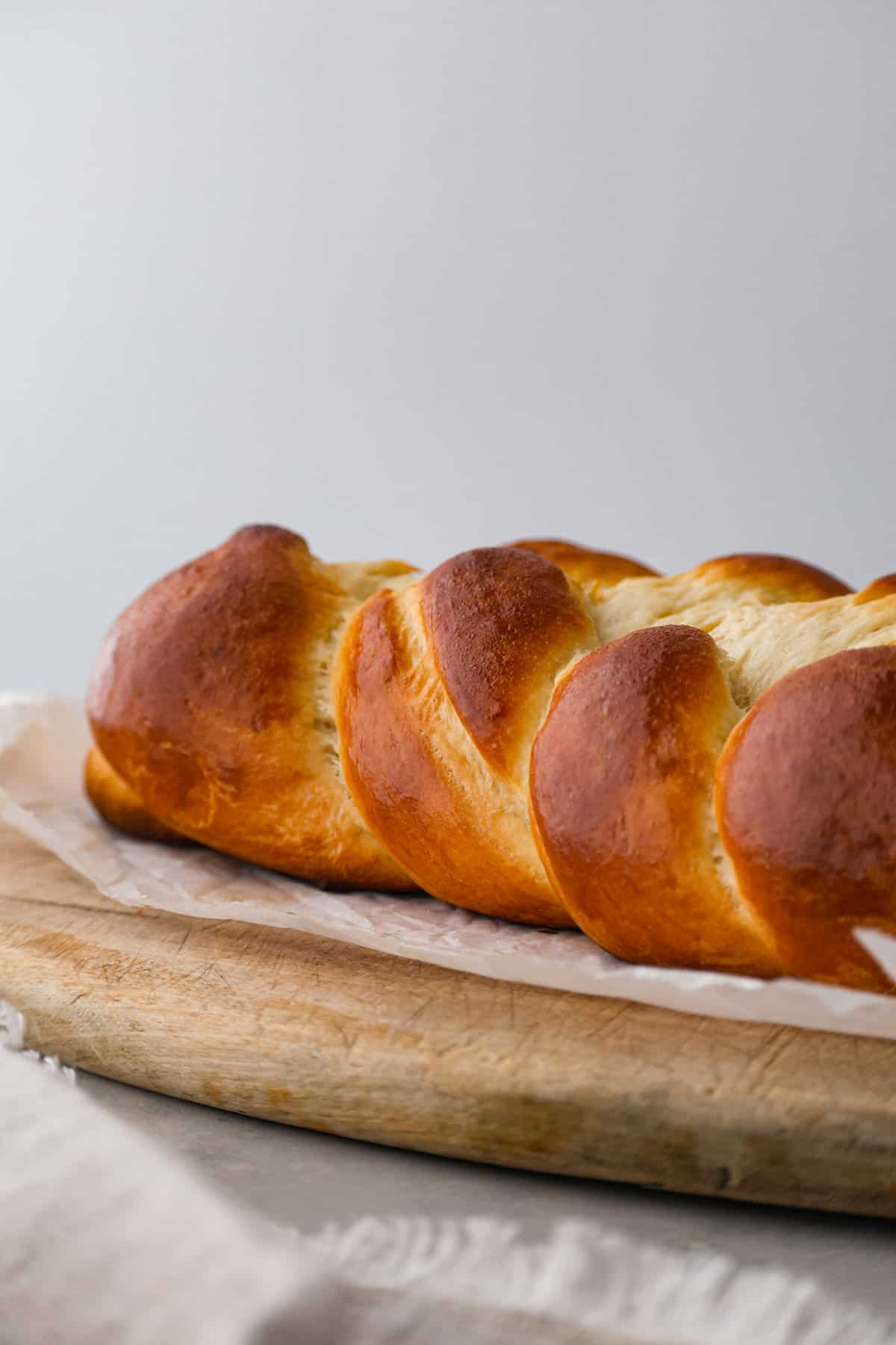 Challah a little too big for the pan but smells great! : r/Breadit