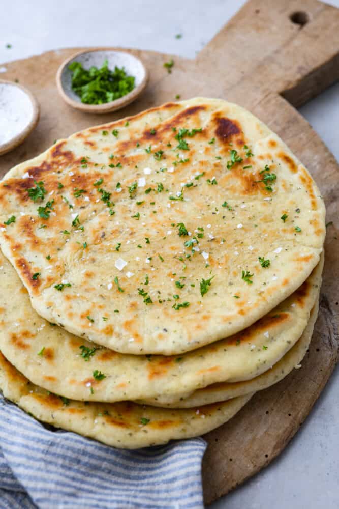 Flatbread on a wooden board.