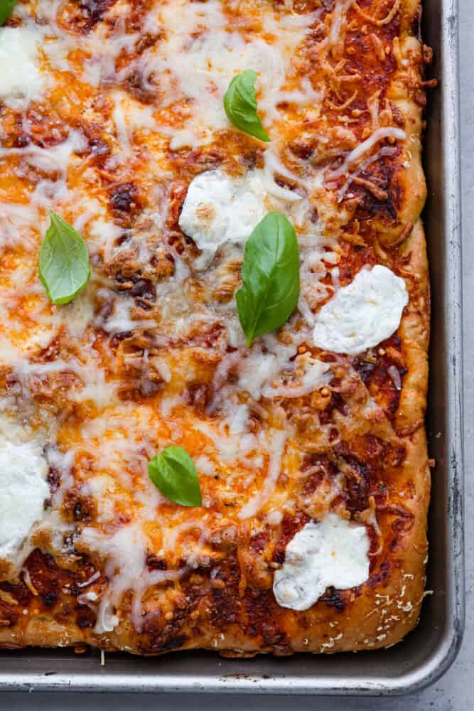 Top-down view of focaccia pizza in the pan.