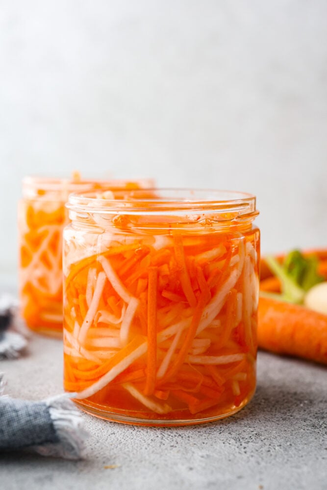 Pickled carrots in a jar.