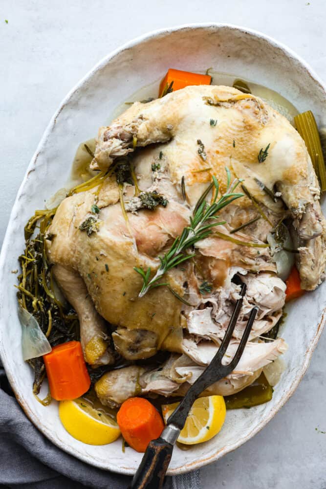 Grate a whole boiled chicken.